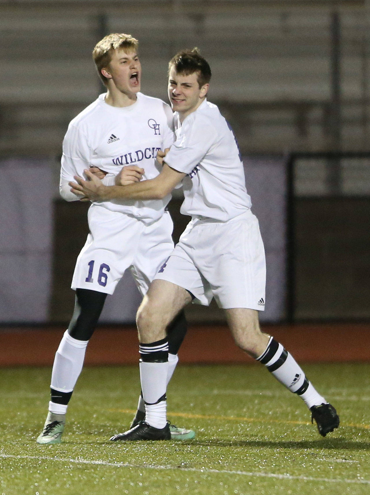 Kurtis Zylstra, left, and Jared Hoyt celebrate Zylstra&rsquo;s goal Tuesday night. (Photo by John Fisken)