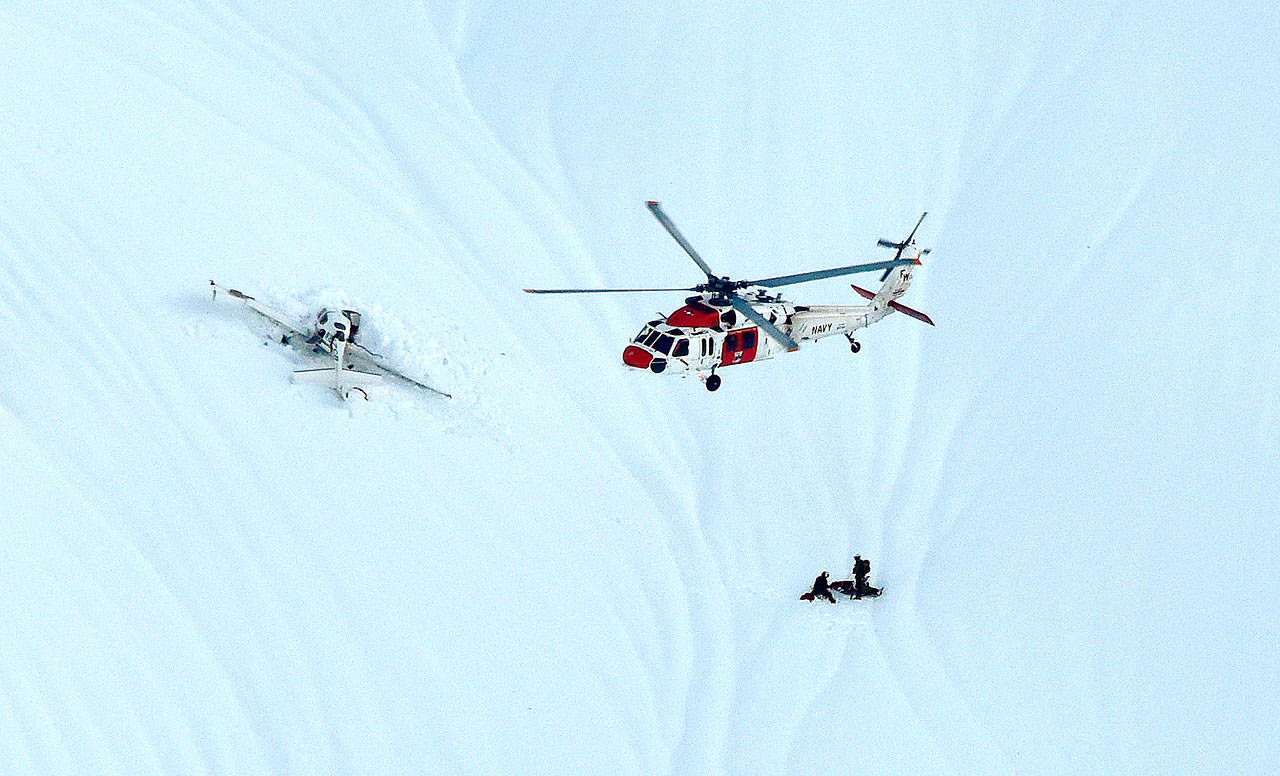 Search and Rescue crews repelled into a valley on Mount Jupiter in Olympic National Park on Sunday to help two people who crashed the plane they were flying. Photo provided by the Washington Wing of the Civil Air Patrol.