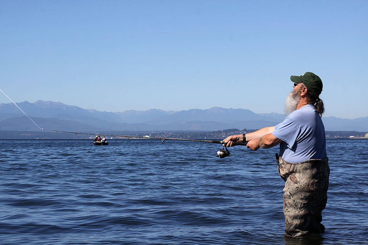Oak Harbor’s Keith Glass casts for pink salmon in the summer of 2015. Opportunities for catching salmon will be slightly improved in some areas around Whidbey Island and restricted all together in others. The 2017 salmon seasons were released this week by the Washington Department of Fish and Wildlife. Photos by Ron Newberry/Whidbey News-Times