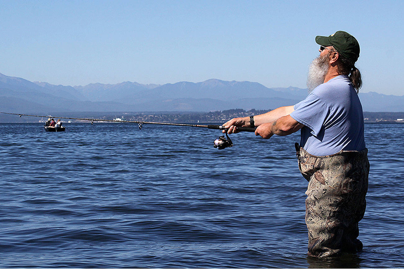 Oak Harbor’s Keith Glass casts for pink salmon in the summer of 2015. Opportunities for catching salmon will be slightly improved in some areas around Whidbey Island and restricted all together in others. The 2017 salmon seasons were released this week by the Washington Department of Fish and Wildlife. Photos by Ron Newberry/Whidbey News-Times