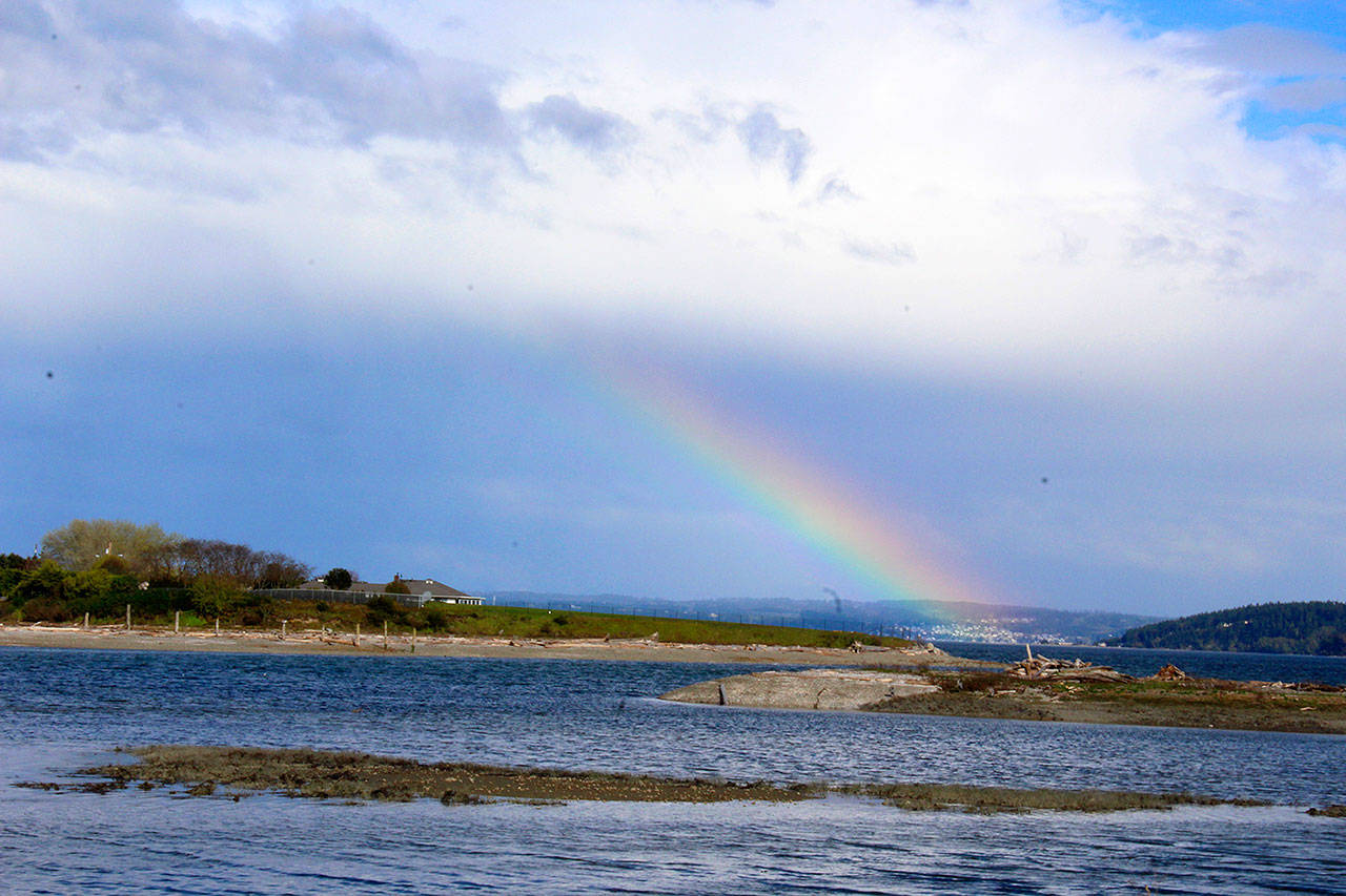 Where there’s clouds and rain there’s also rainbows. This one makes an appearance over Penn Cove. Photo by Patricia Guthrie/Whidbey News-Times