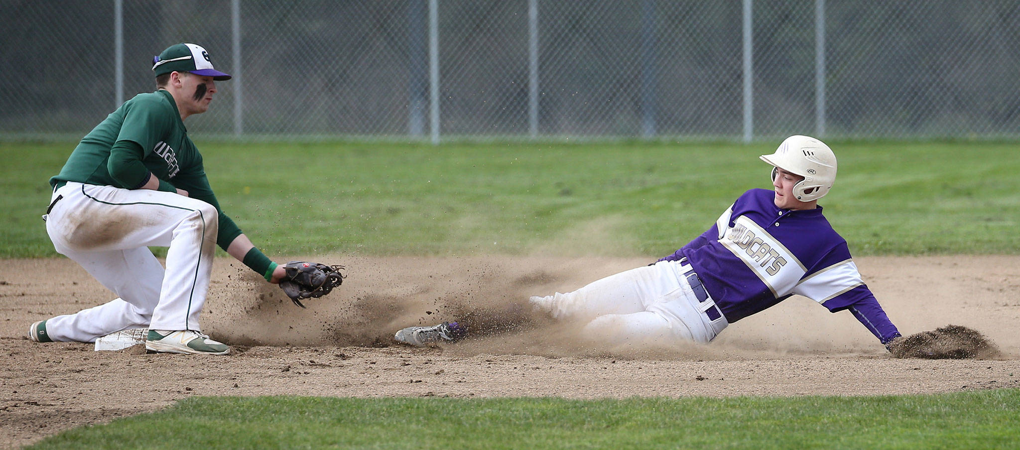 Trent Benson attempts to steal second base in Friday’s win over Edmonds-Woodway. (Photo by John Fisken)