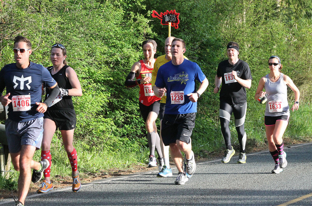 Half-marathon runners race through the back roads of Whidbey last year. (Photo by Jim Waller/Whidbey News-Times)