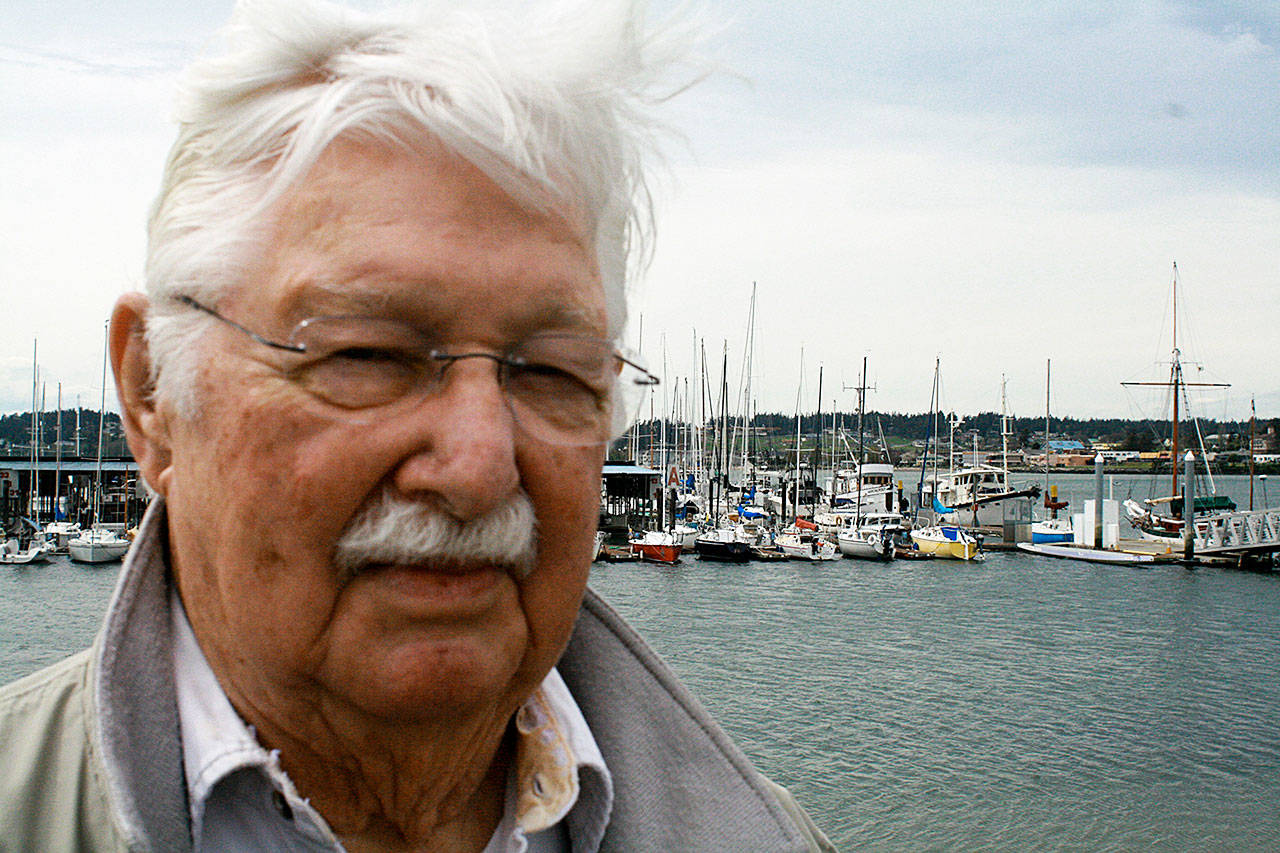 Jim McAlpine is the oldest participant in Oak Harbor Yacht Club’s weekly sailing races. Going on 88, his passion for sailing has led him on a lifetime of adventures. Photo by Daniel Warn/Whidbey News-Times