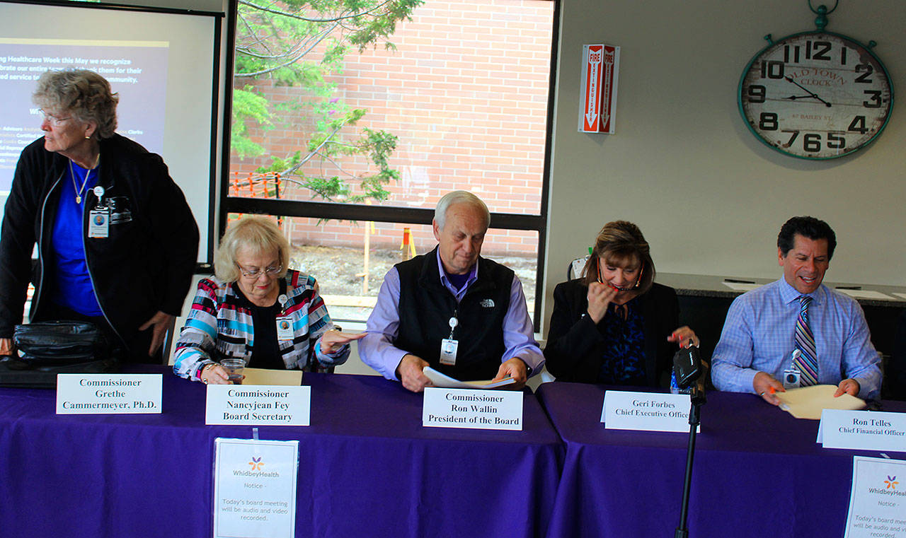 The uncertainty of health insurance coverage garnered much attention at Monday’s meeting of the Whidbey Island Public Hospital District Board of Commissioners. Left to right, commissioners Grethe Cammermeyer, Nancy Fey, board president Ron Wallin, WhidbeyHealth CEO Geri Forbes and WhidbeyHealth CFO Ron Telles.                                 Photo by Patricia Guthrie