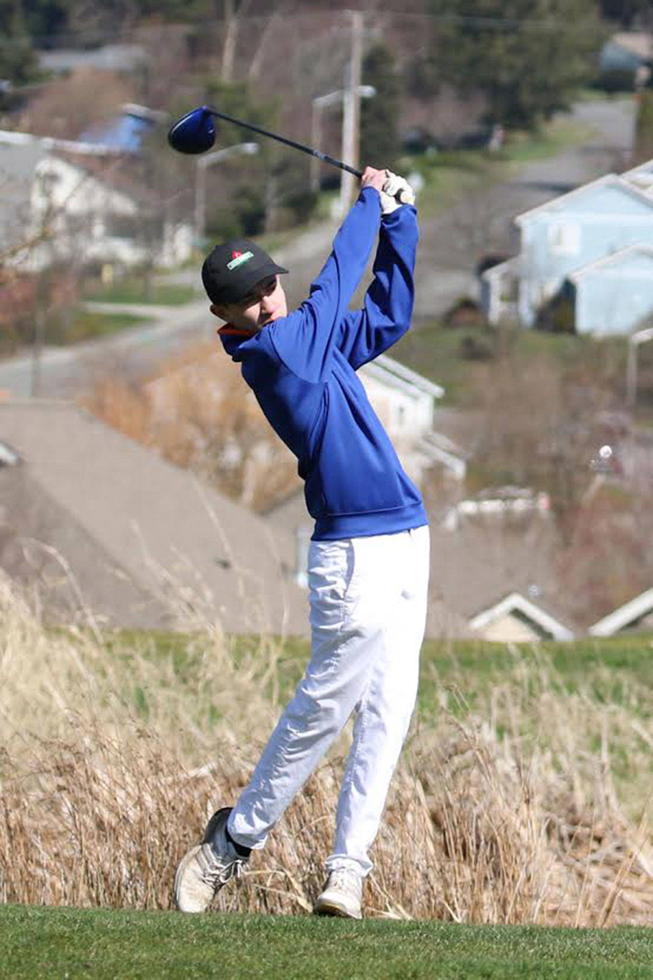Nick Krantz qualified for the state golf tournament by placing 11th at district. (Photo by John Fisken)