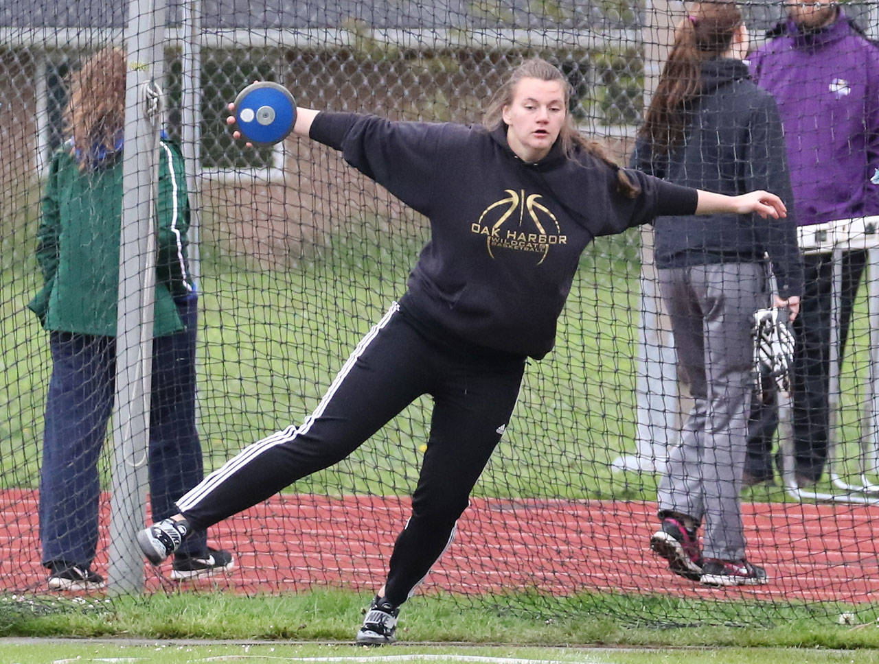 Julie Jansen gets ready to let her discus fly in the Twilight Invitational. (Photo by John Fisken)