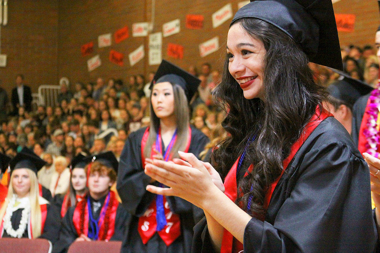 Robin Cedillo, right, gets ready to step up and receive her diploma during the commencement ceremony for Coupeville High School’s Class of 2017 Friday night, June 9, 2017. Emily Rose is in the background. Photo by Ron Newberry/Whidbey News-Times
