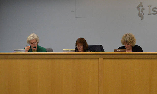 Council members Catherine Ballay, left, Diane Binder, center, and Pat Powell discussed making changes to the town’s 2 percent application process. 2017 Whidbey News-Times file photo