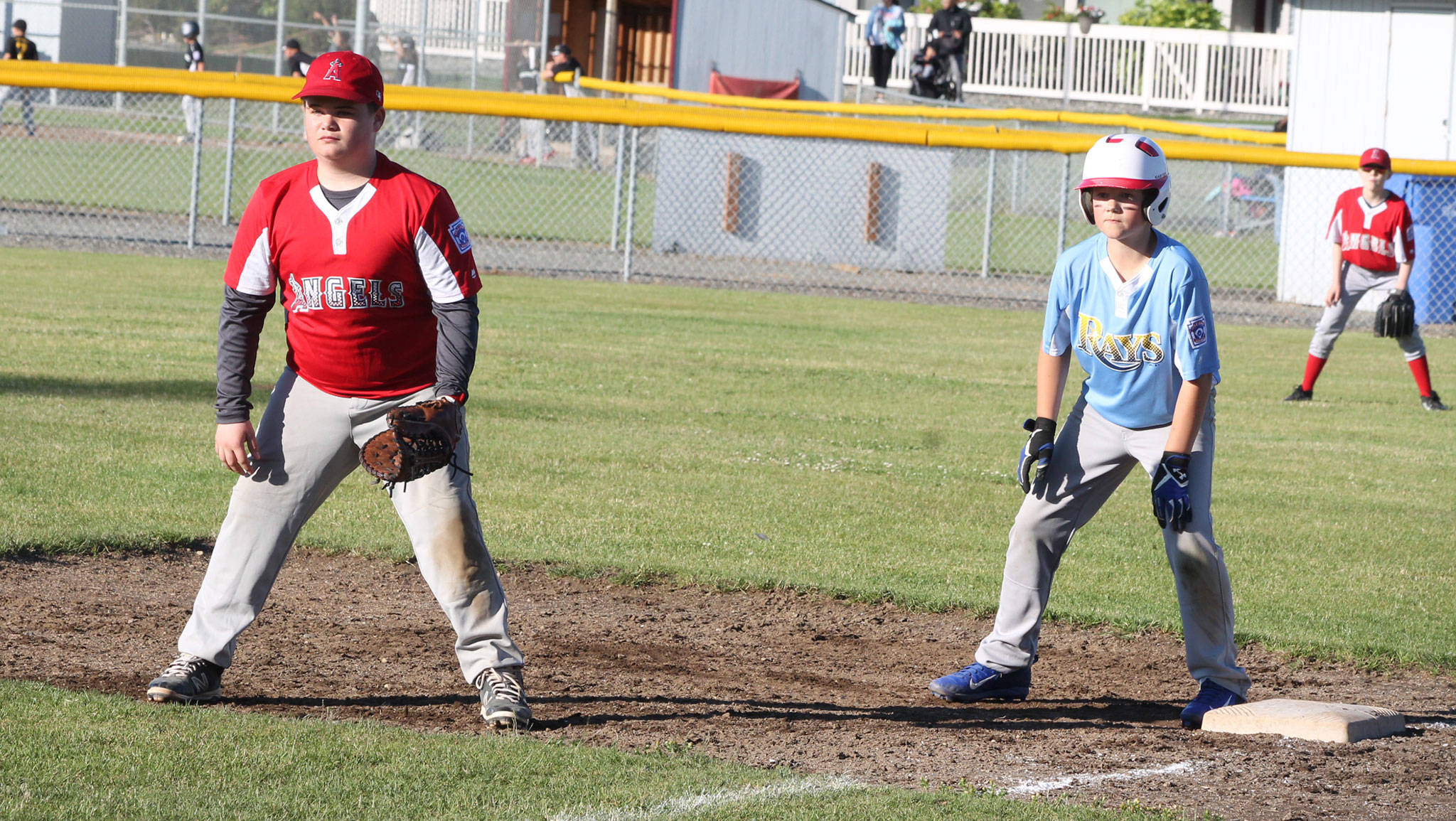 Brady Towsley, left, and Travis Westman compete in the Andrade Tournament last week. Now the North and Central Whidbey Little Leaguers are preparing for district tournament play. (Photo by Jim Waller/Whidbey News-Times)