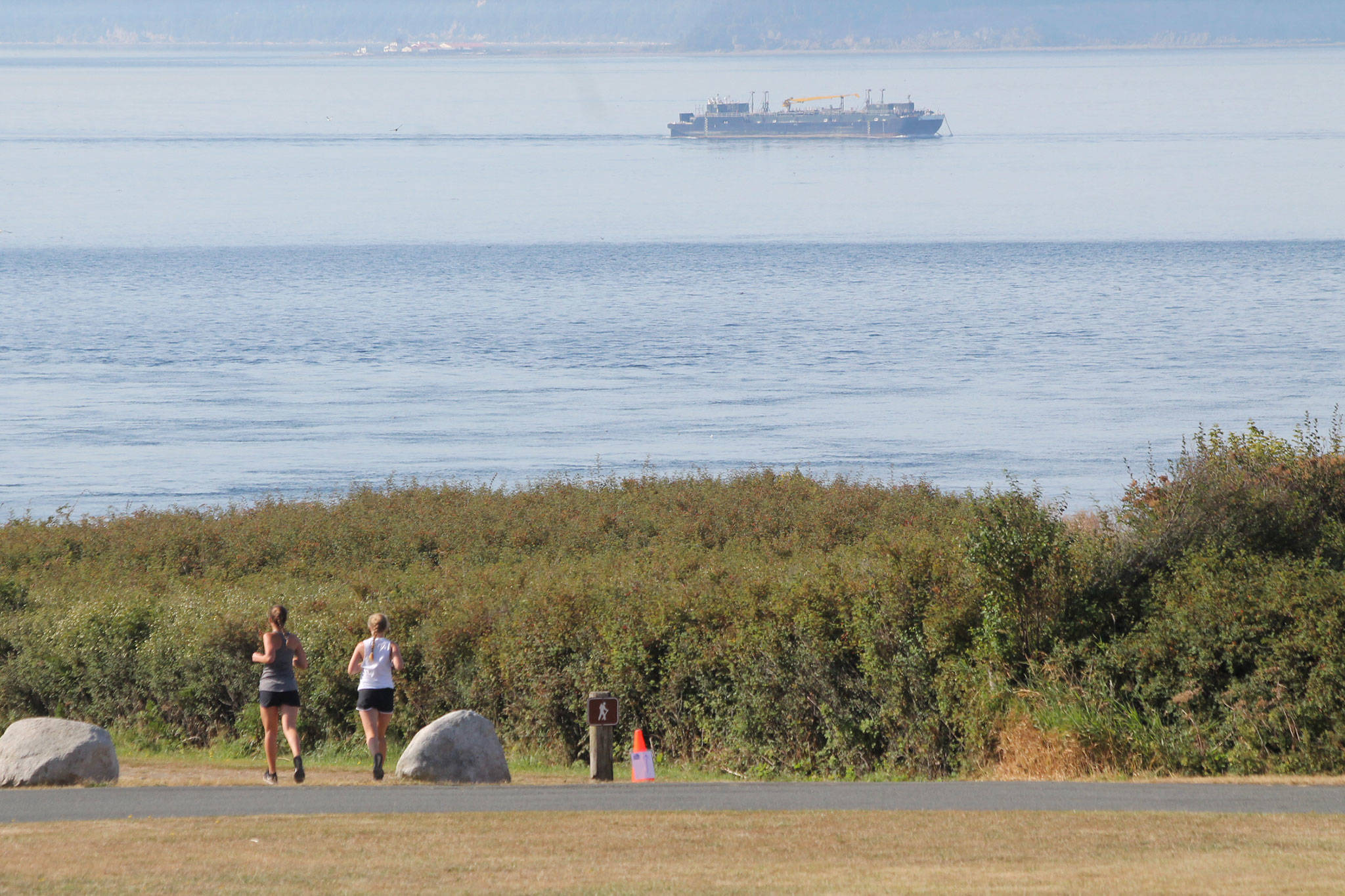 Runners head toward Fort Casey during last year’s Race the Reserve. This year’s event is set for Aug. 12. (Photo by Jim Waller/Whidbey News-Times)