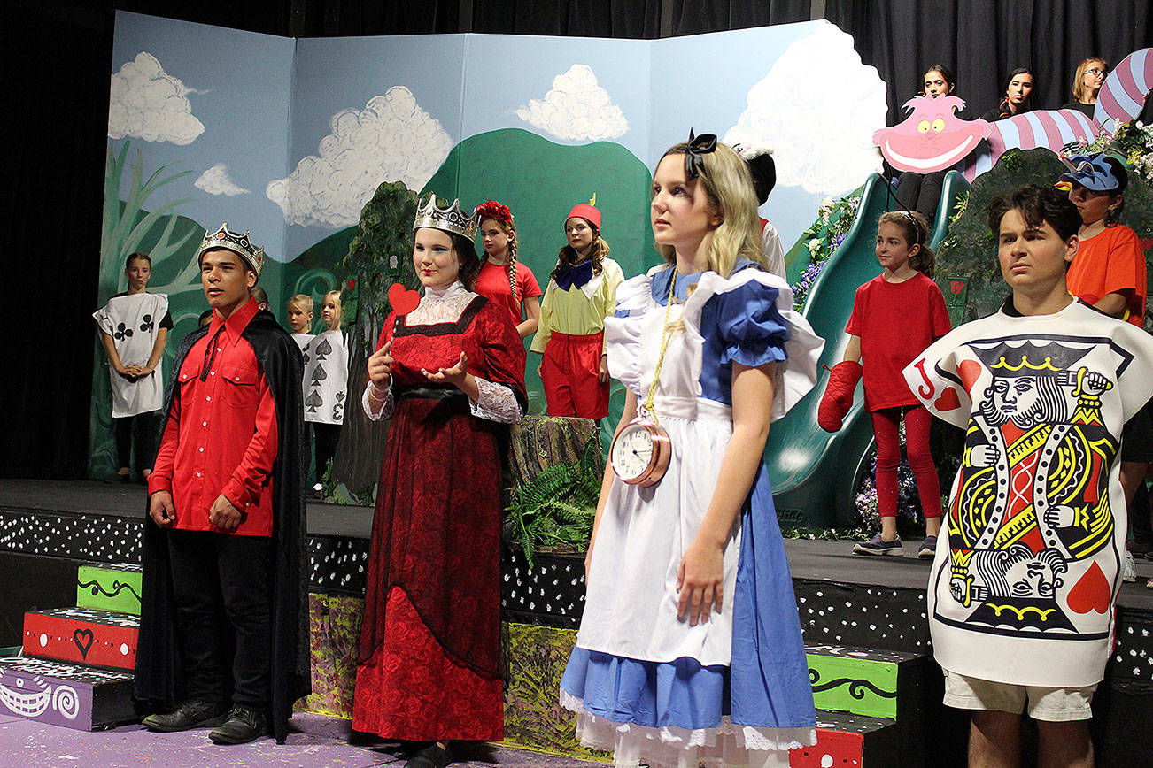 Scenes from Whidbey Playhouse COmmunity Theater Disney Alice in Wonderland Jr. press night. More than 50 local kids take part in this condensed, timeless story of Alice and the cast of zany characters, Mad Hatter, White Rabbit, Queen of Hearts and Tweedle Dee and Tweedle Dum. Directed by Stan Thomas, producer is Allenda Jenkins.
