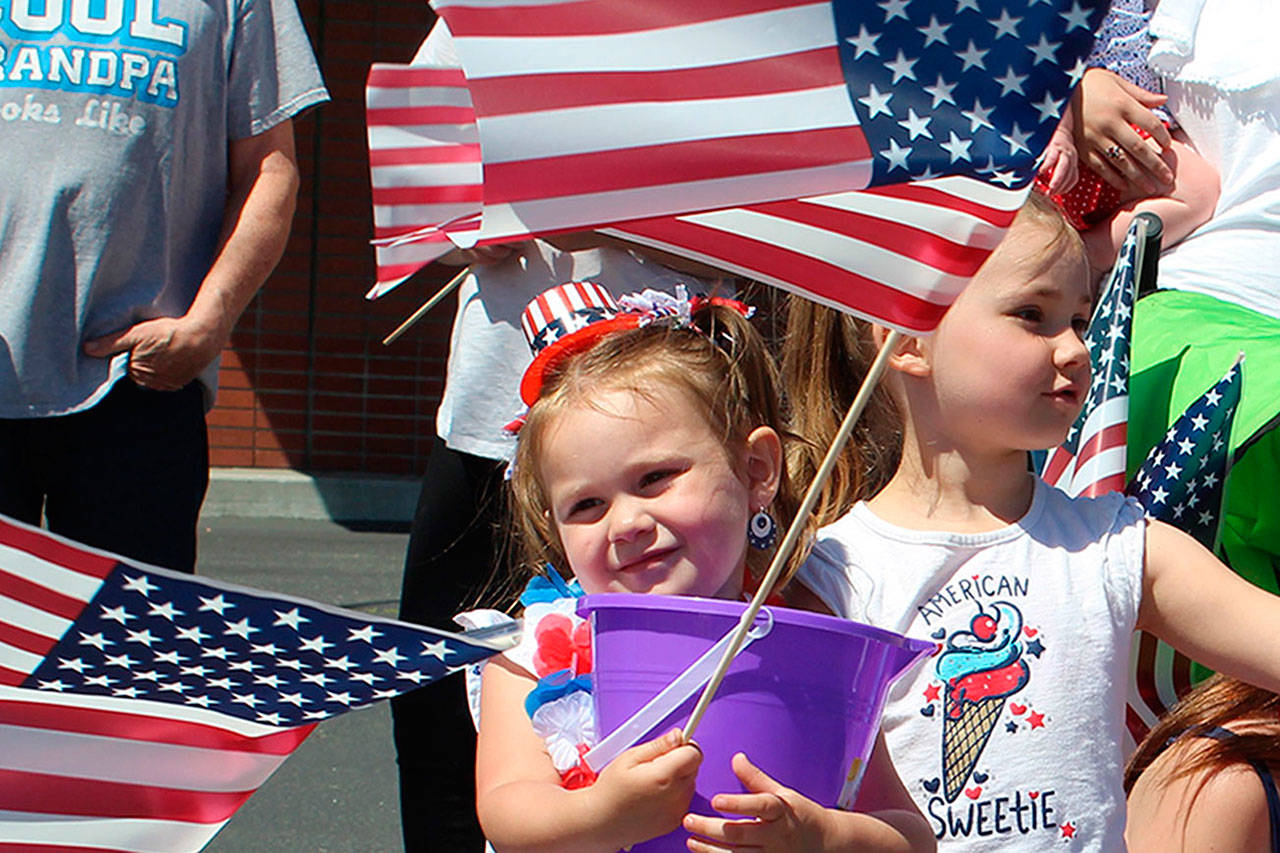 Kids, flags and families salute America’s birthday at Oak Harbor parade