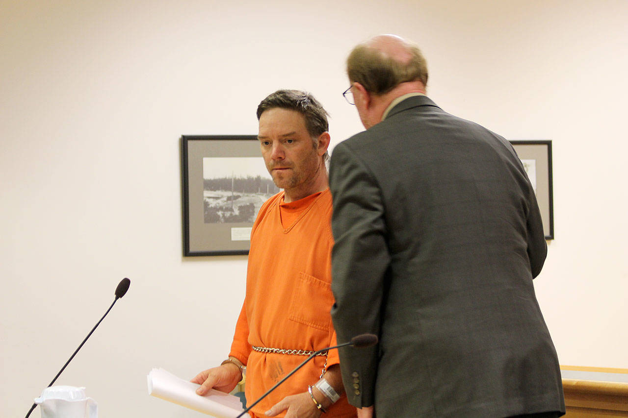 Photo by Jessie Stensland / Whidbey News-Times                                Arson suspect Blake Fountain appears in court Friday afternoon with attorney Craig Platt.