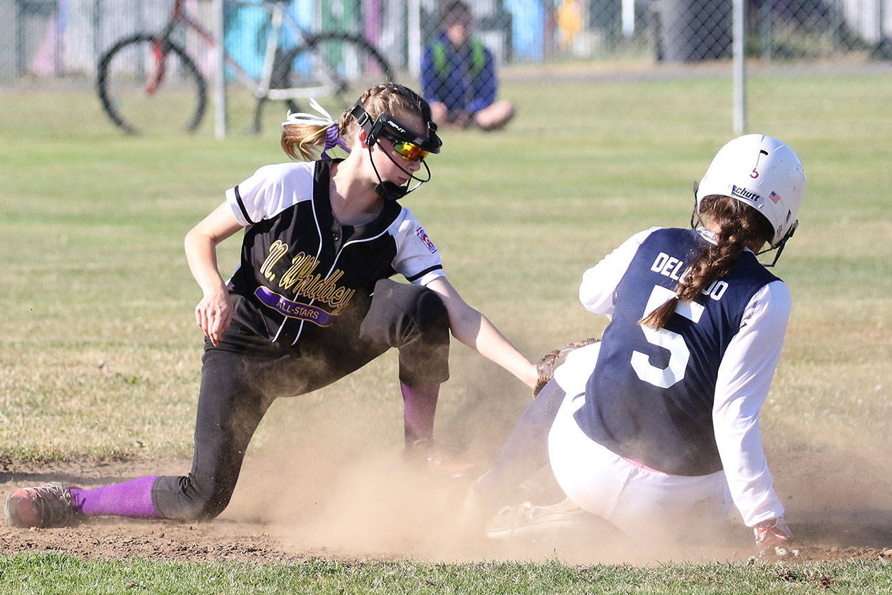 NW falls to defending champion in first state game / 11/12 softball