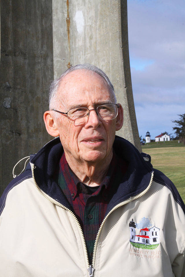 Volunteer Dick Malone of Oak Harbor stands on the grounds of Fort Casey State Park in February. Malone, who provides guided tours of the former World War I-era army post and is a docent at Admiralty Head Lighthouse, was named &lsquo;Volunteer of the Year&rsquo; by Washington State Parks. 2017 File Photo/Whidbey News-Times