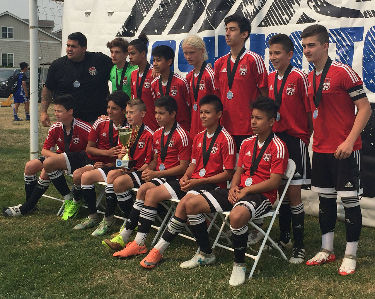 Matt Kelley (third from right, back row) helped Northwest United win the Rush Cup this weekend. (Submitted photo)
