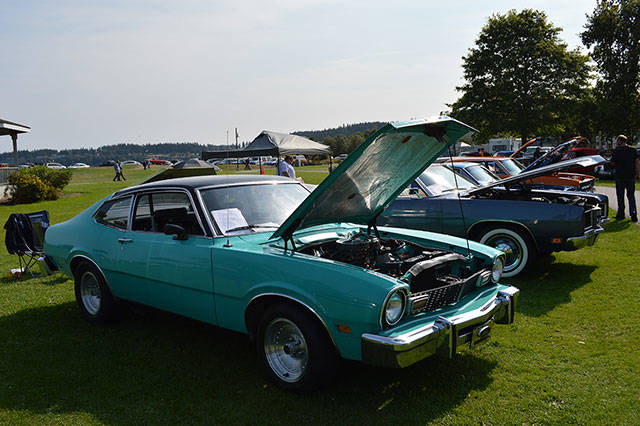 This 1977 Ford Maverick, owned by Jordan Paiz, is displayed among other cars in its division at the North Whidbey Car Show Saturday. The show featured 233 vehicles across 21 categories. Photo by Laura Guido/Whidbey News-Times