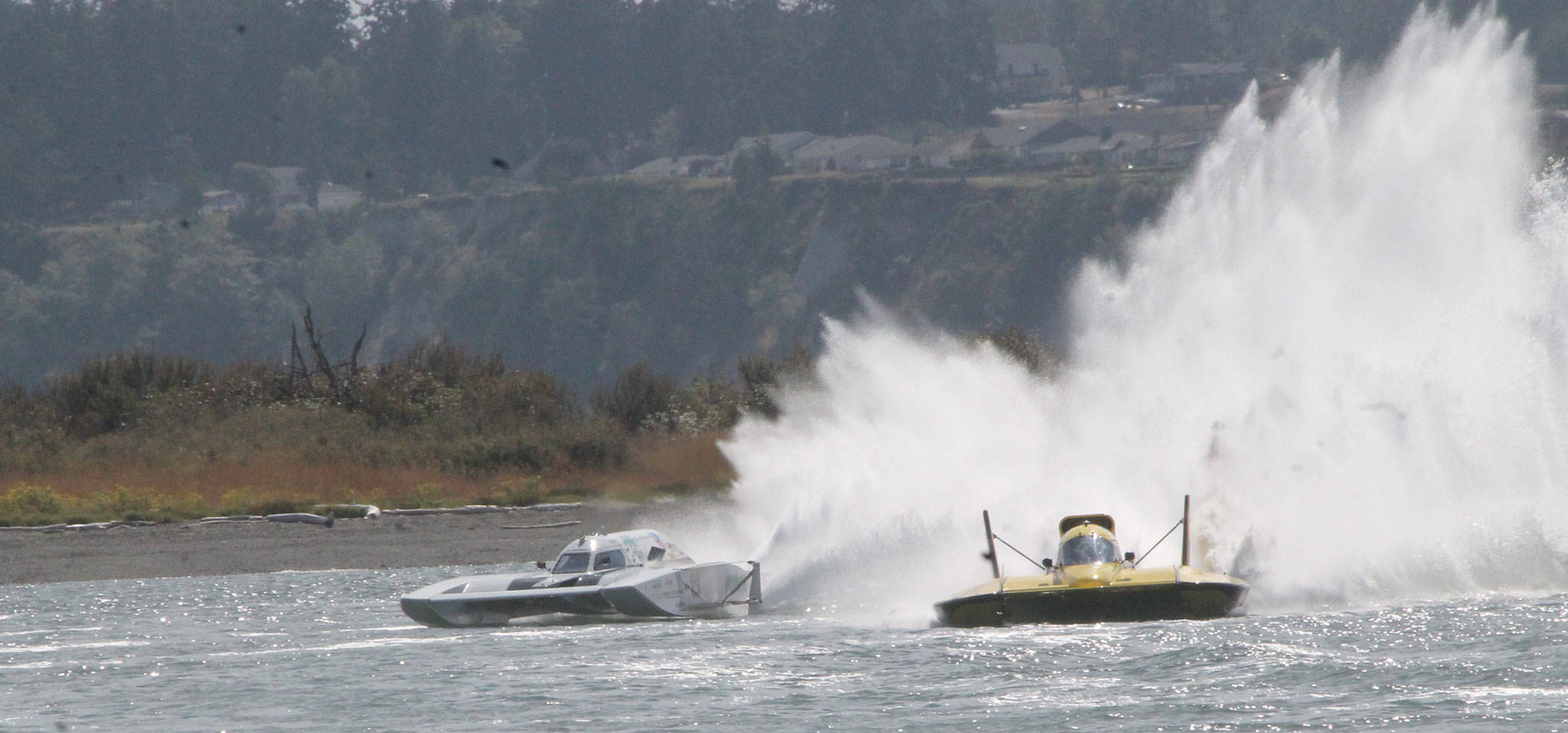 Two Grand Prix class boats come out of the second turn Sunday. (Photo by Jim Waller/Whidbey News-Times)