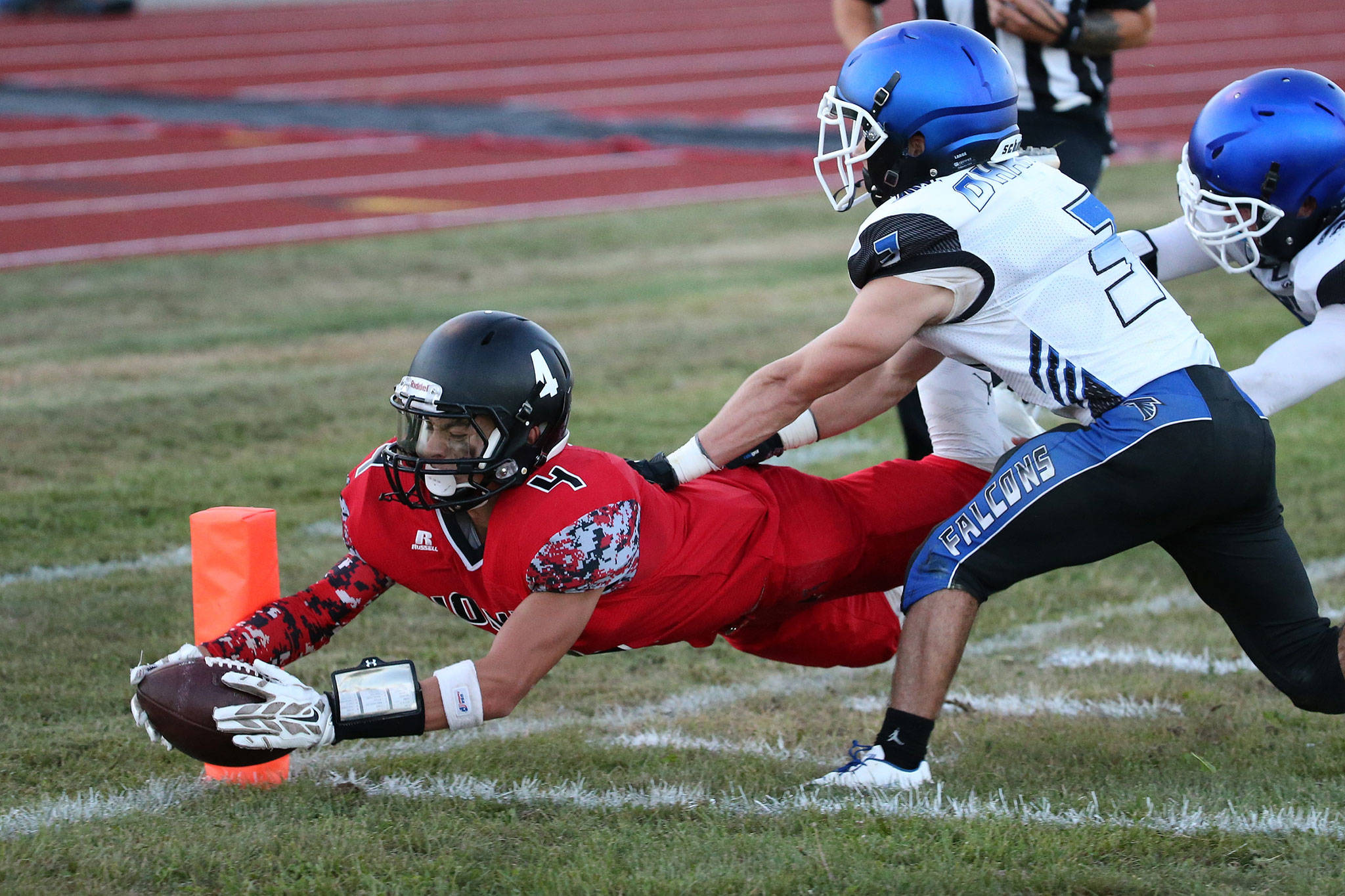 Hunter Smith dives into the end zone for a touchdown last year. Smith set a school record for TD receptions in 2016. (Photo by John Fisken)