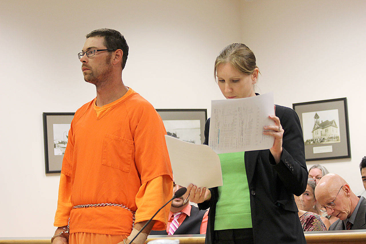 Photo by Jessie Stensland / Whidbey News-Times                                Jonathan Rasmussen appears in Island County Superior Court Monday after he allegedly killed a dog with a pickaxe.