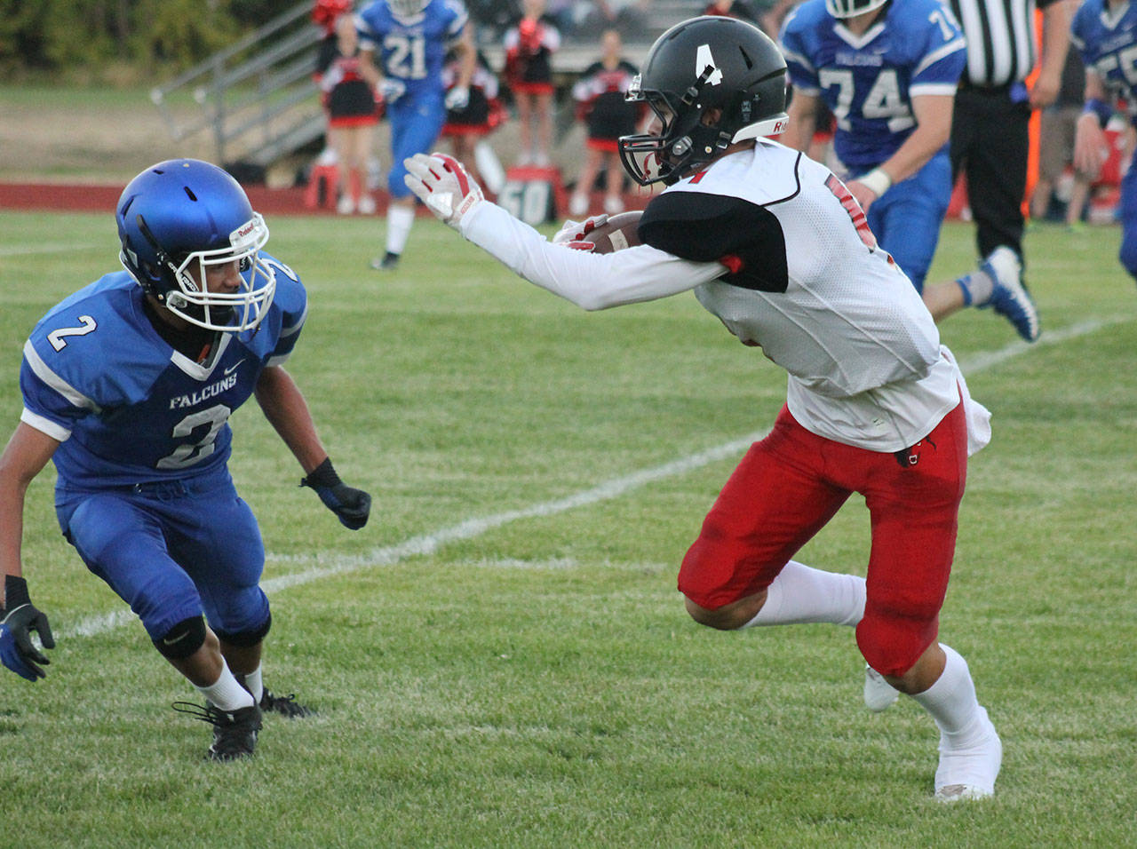 Coupeville’s Hunter Smith tries to get by Alex Black (2). (Photo by Evan Thompson/Whidbey News Group)