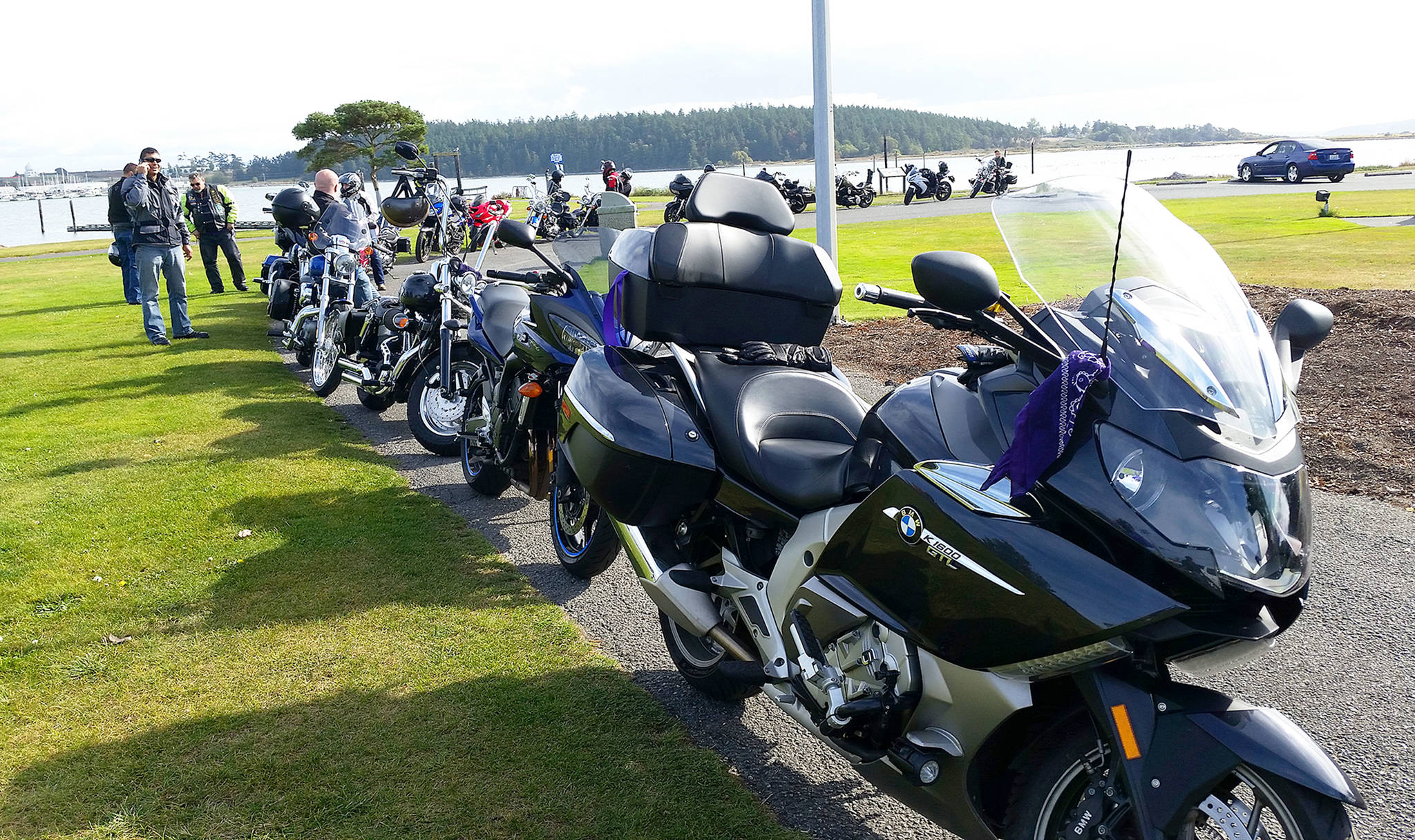 During last year’s Naval Air Station Whidbey Island’s “Stop the Cycle” Motorcycle Awareness Ride, stops were made along the route to Anacortes. This Friday, riders will travel to Freeland and Oak Harbor to bring attention to domestic violence. Photo provided