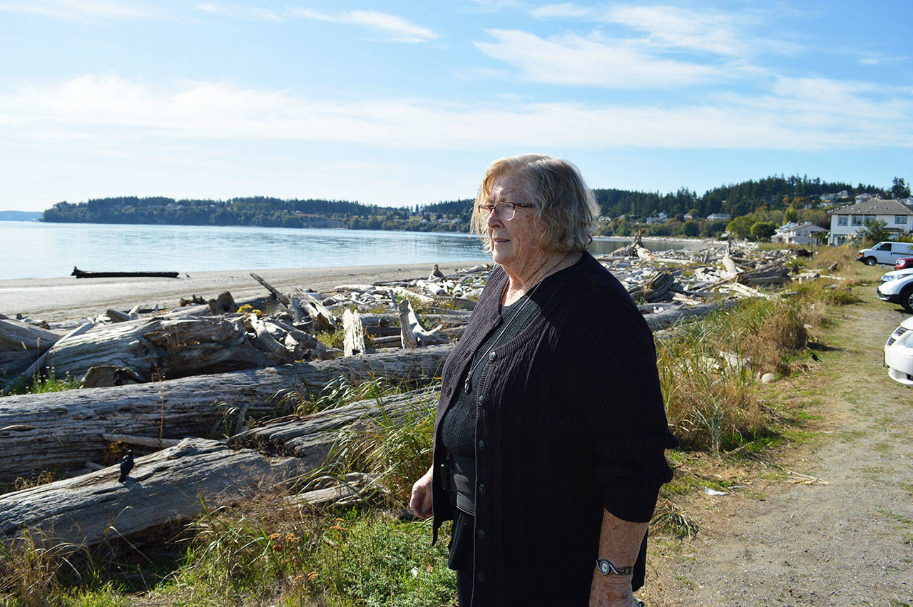 Rowenna Houghton, a breast cancer survivor, takes in the view at Windjammer Park Monday morning. She recently moved to Oak Harbor after her cancer diagnosis delayed her move to the island by 13 years. Photo by Laura Guido/Whidbey News-Times