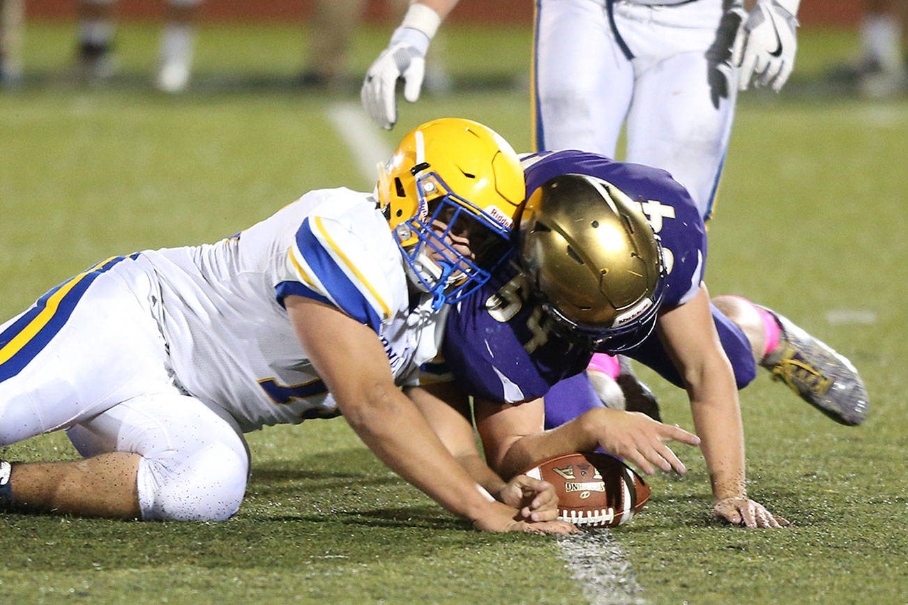 Comeback falls just short; Wildcats lose 29-28 in overtime / Football
