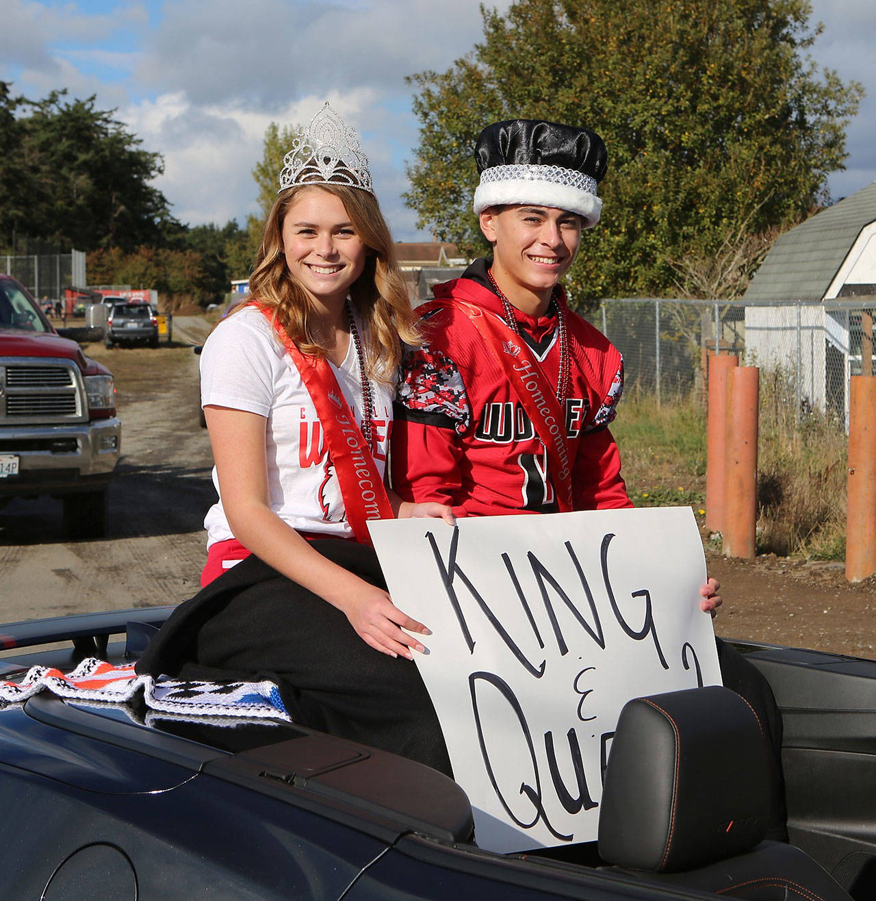 Coupeville High School’s homecoming queen and king, Payton Aparicio and Hunter Smith, begin the parade Friday.(Photo by John Fisken)