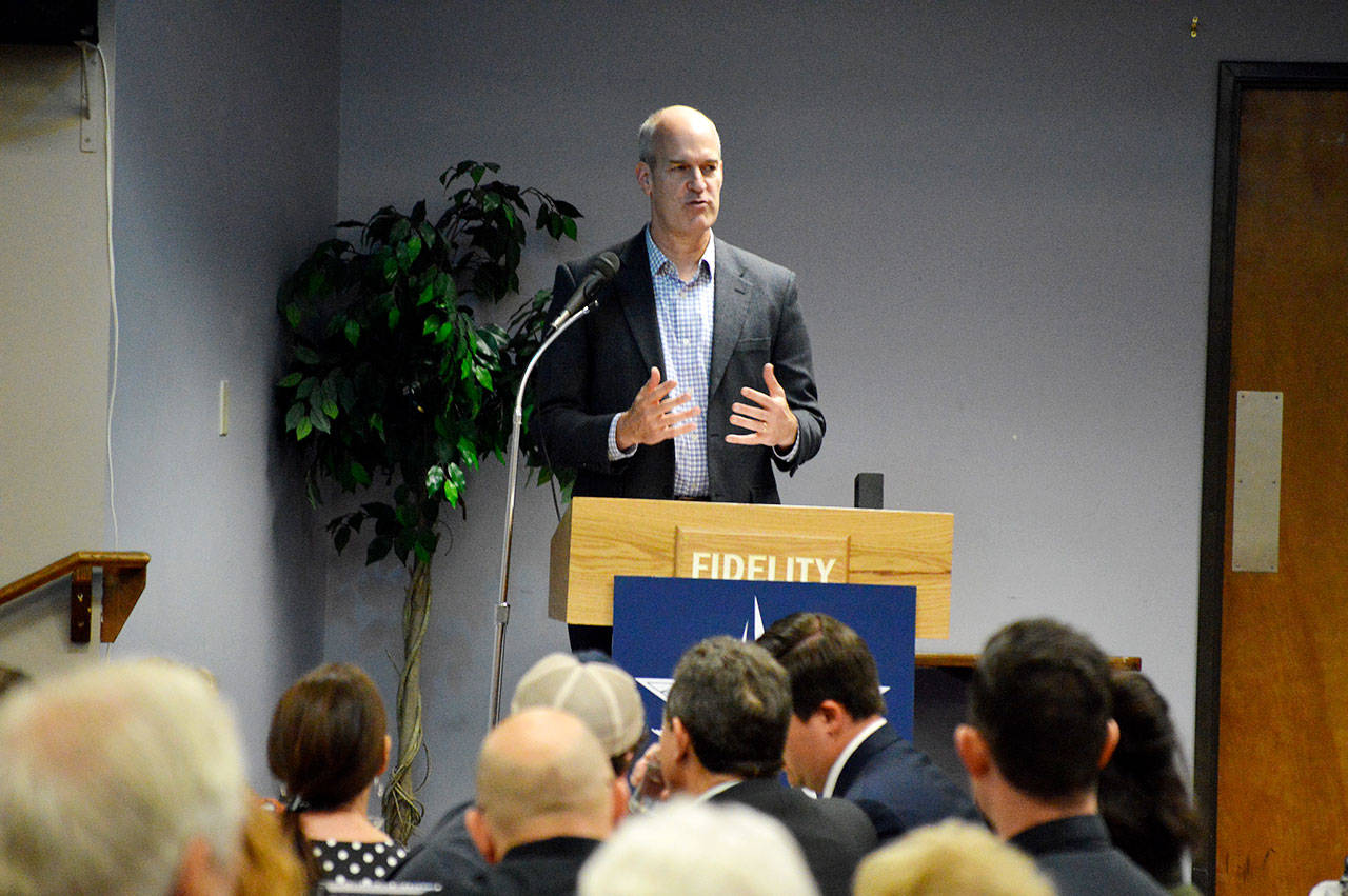 Rep. Rick Larsen addresses national and local issues during an Oak Harbor Chamber of Commerce luncheon last week. Photo by Laura Guido/Whidbey News-Times
