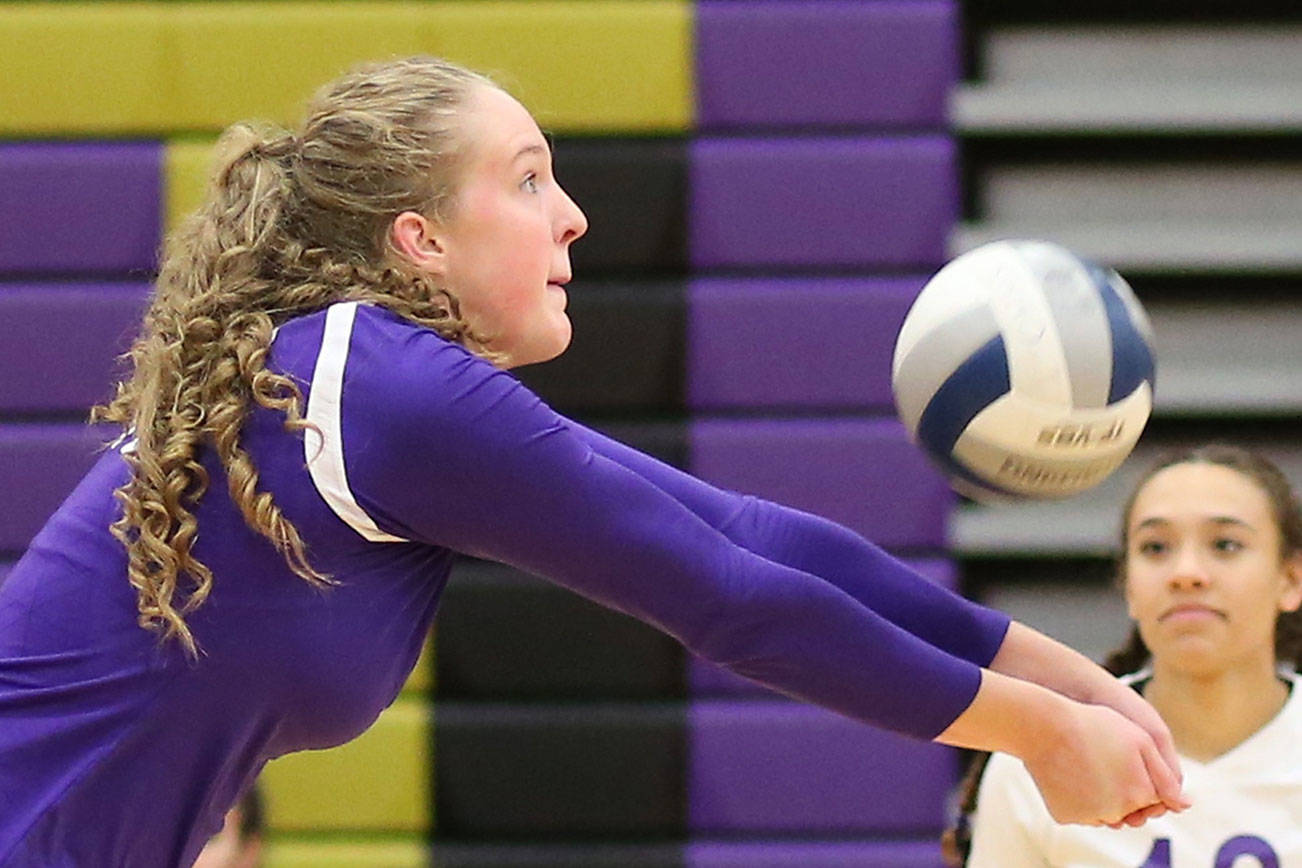 Wildcats grab playoff spot with win / Volleyball