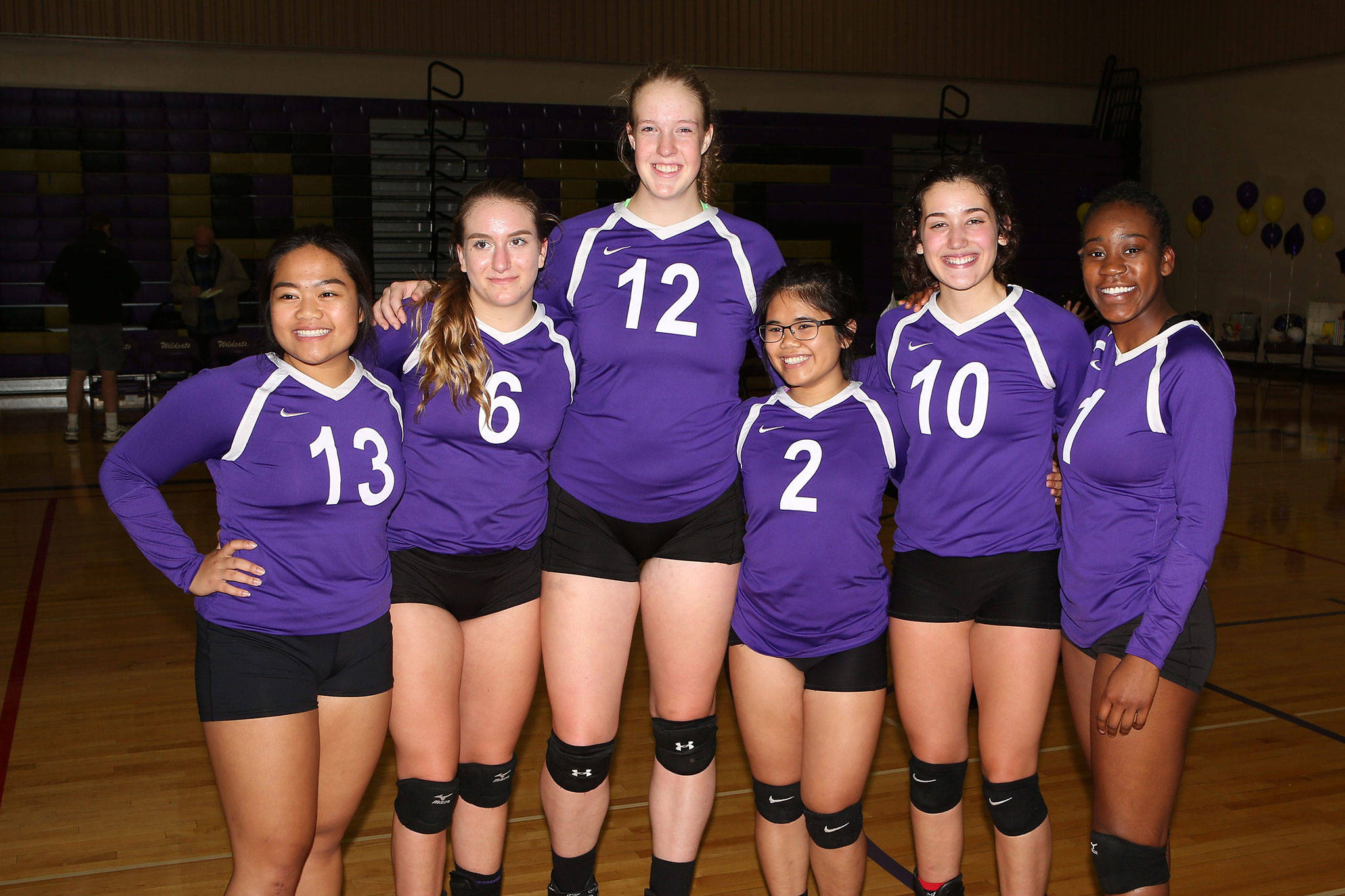 Oak Harbor honored its seniors Thursday night (from the left): Andrea Ruben, Samantha Hines, Hailee Blau, Sherilyne Fernandez, Kristina Tirado and Kia Ceya. Because you are wondering, Blau is 6-foot, 3-inches; Fernandez is 5-0.(Photo by John Fisken)