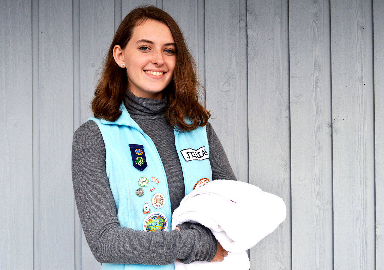 Ninth grader Jillian Taylor created &ldquo;Laundry Angels&rdquo; to provide clean towels for homeless individuals who use the shower at the Oak Harbor pool for her Girl Scout Silver Award project. Photo by Laura Guido/Whidbey News-Times
