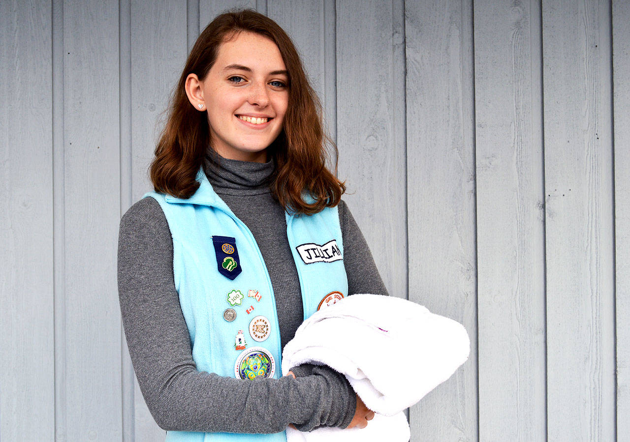 Ninth grader Jillian Taylor created “Laundry Angels” to provide clean towels for homeless individuals who use the shower at the Oak Harbor pool for her Girl Scout Silver Award project. Photo by Laura Guido/Whidbey News-Times
