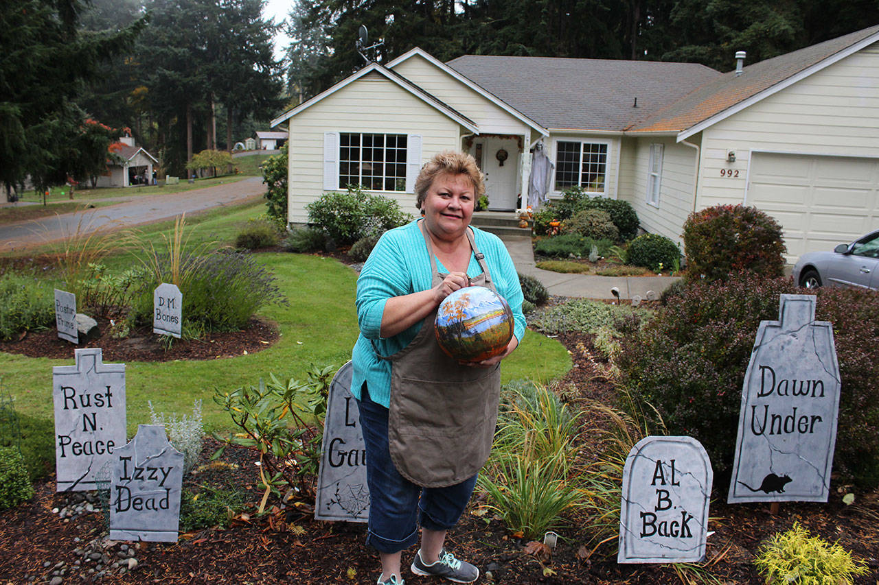 Ivy Breen left many a painted pumpkin on the doorsteps of Coupeville businesses this fall. “They never saw me. I was like the Great Pumpkin.” Photos by Patricia Guthrie/Whidbey News-Times