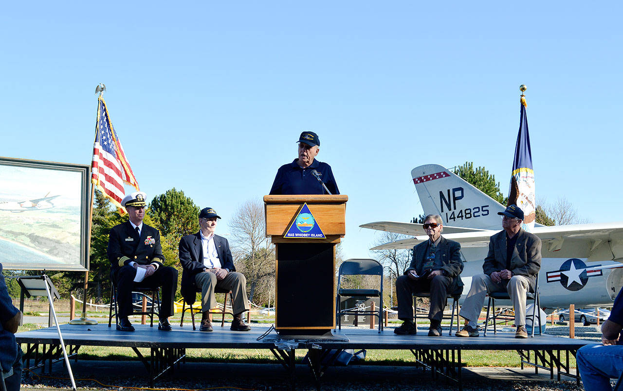 Retired Navy Reserves Capt. James VanderHoek speaks at a celebration in from of the A-3 Skywarrior memorial aircraft near Langley Gate Thursday afternoon. The group celebrated the 65th anniversary of the first flight of the skywarrior. Behind him from the left, Capt. Geoffrey Moore, Frank Cogdell, Al Archer and Bill Burklow. Photo by Laura Guido/Whidbey News-Times