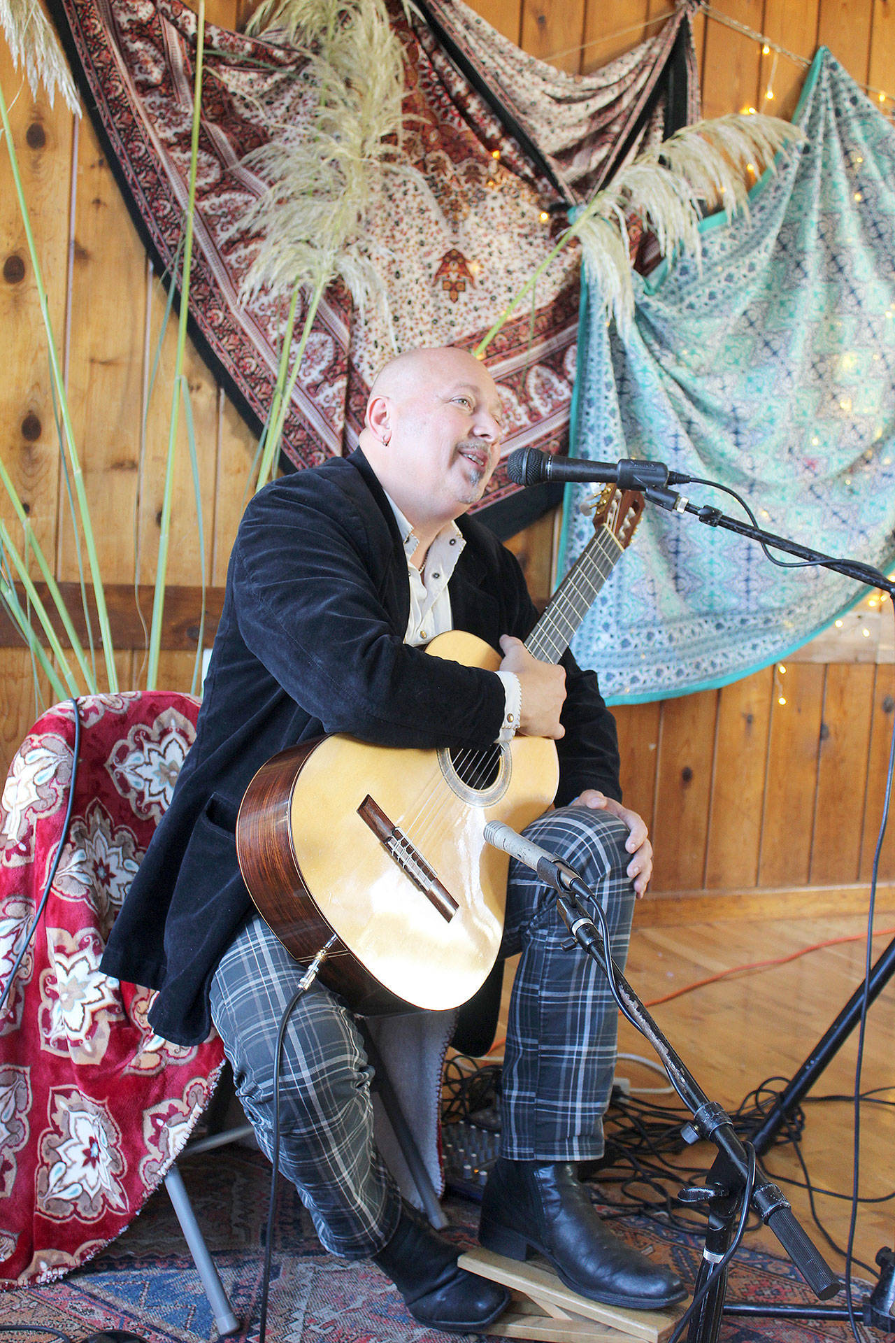 Classical guitarist and South Whidbey newcomer Andre Feriante played at the recent launch party for Island Bohemians Cafe at Greenbank Progressive Hall. An off-shoot of Whidbey Island Arts Council, it hopes to bring together artists from all disciplines to spark creativity and alliances. Photos by Patricia Guthrie/Whidbey News-Times