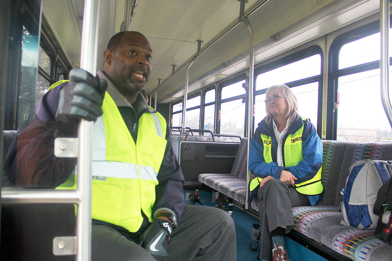 Bringing back Saturday service for Island Transit means hiring and training new drivers. Operations manager Shawn Harris, left, and Linda Nienhuis, recently rode along with two trainees.“That’s the No. 1 question we get. ‘When are we going to bring back Saturday service?’” Harris said. Photo by Patricia Guthrie/Whidbey News-Times