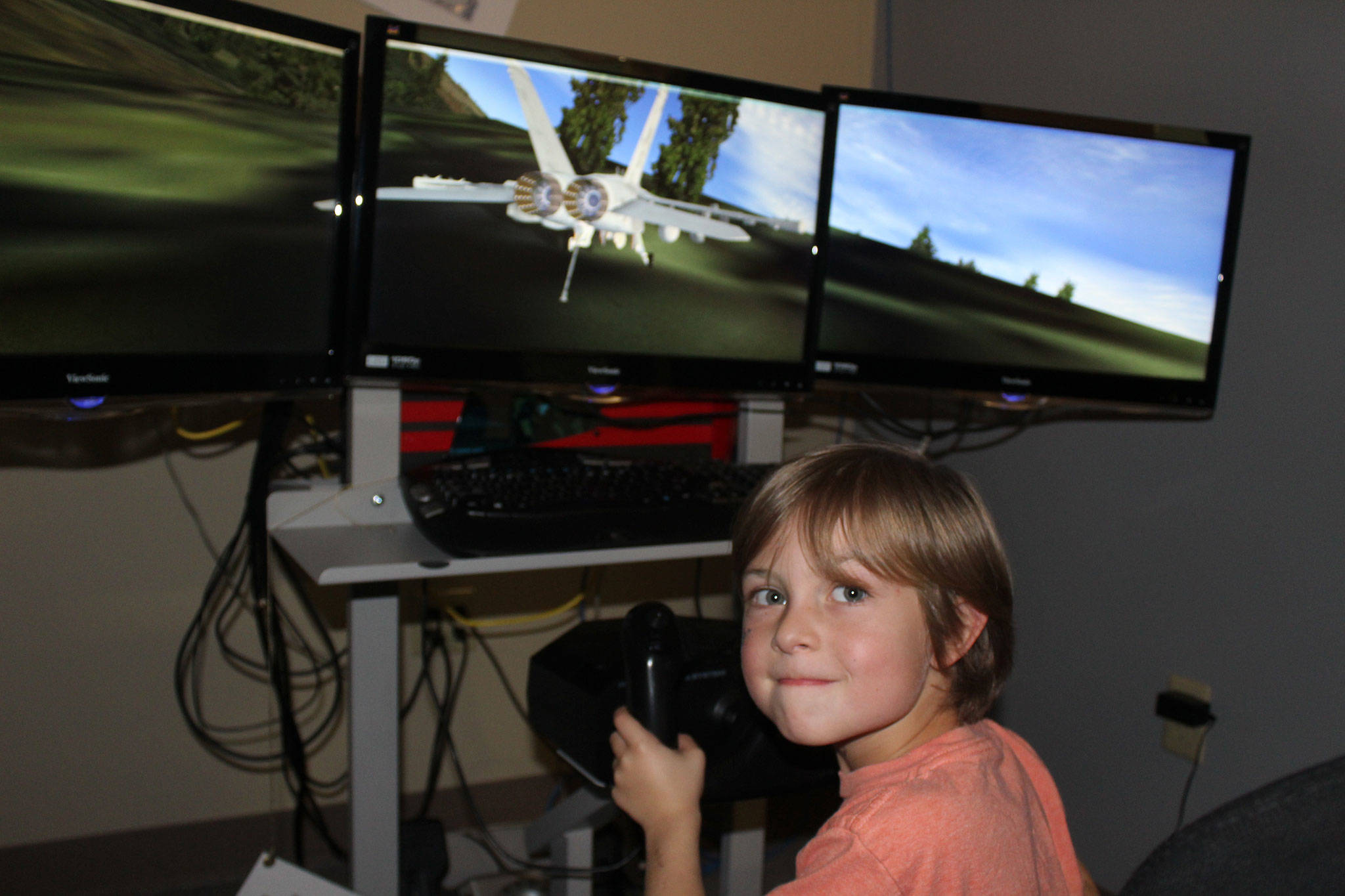 Henry Zovar, 7, takes off with a flight simulator that’s popular with kids inside the PBY Naval Air Museum. Zovar’s grandfather was a pilot at Naval Air Station Whidbey Island. His family visited on Veteran’s Day.
