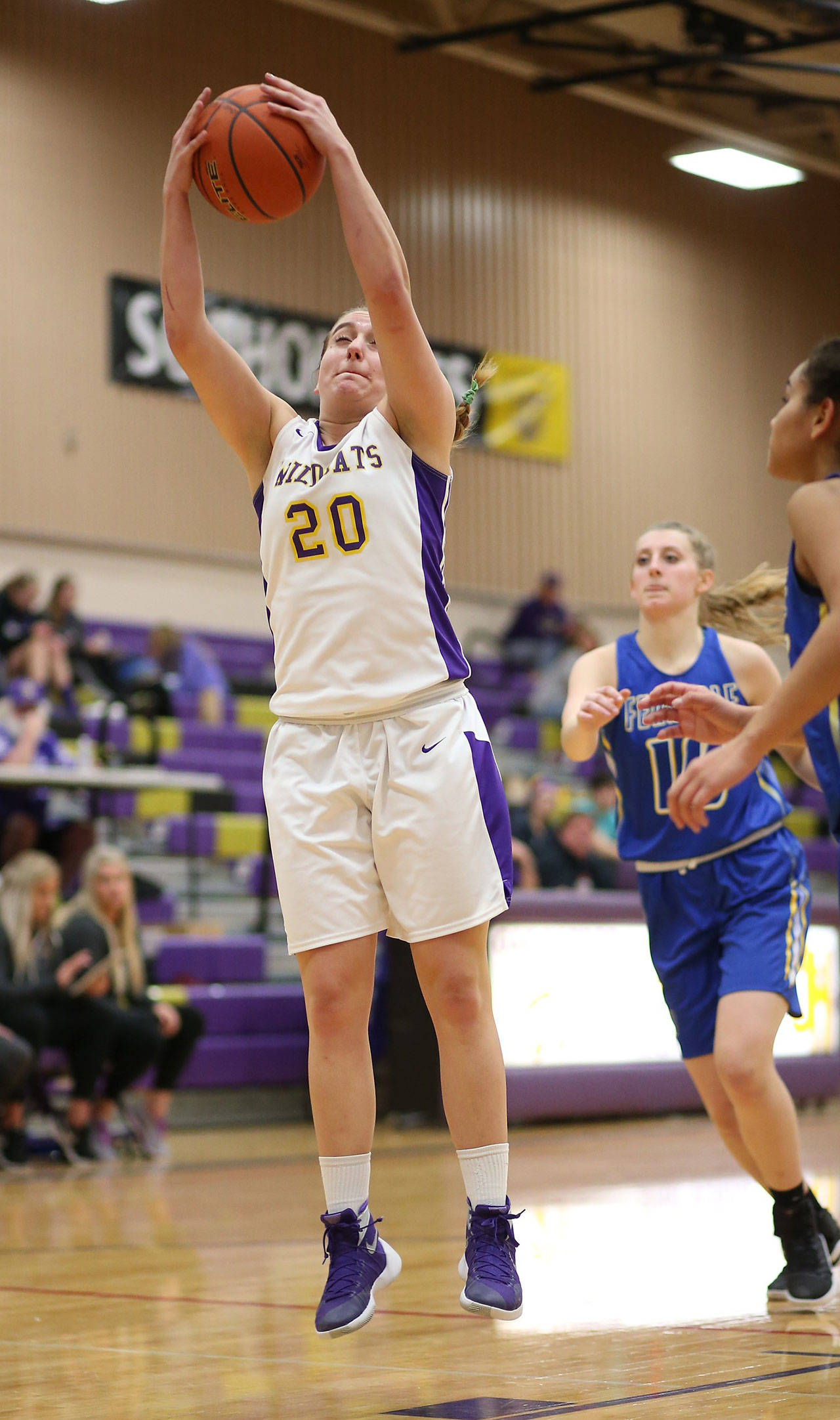 Samantha Hines hauls in a rebound against Ferndale Monday. Earlier this season she tied the schools single-game rebounding record with 26. (Photo by John Fisken)