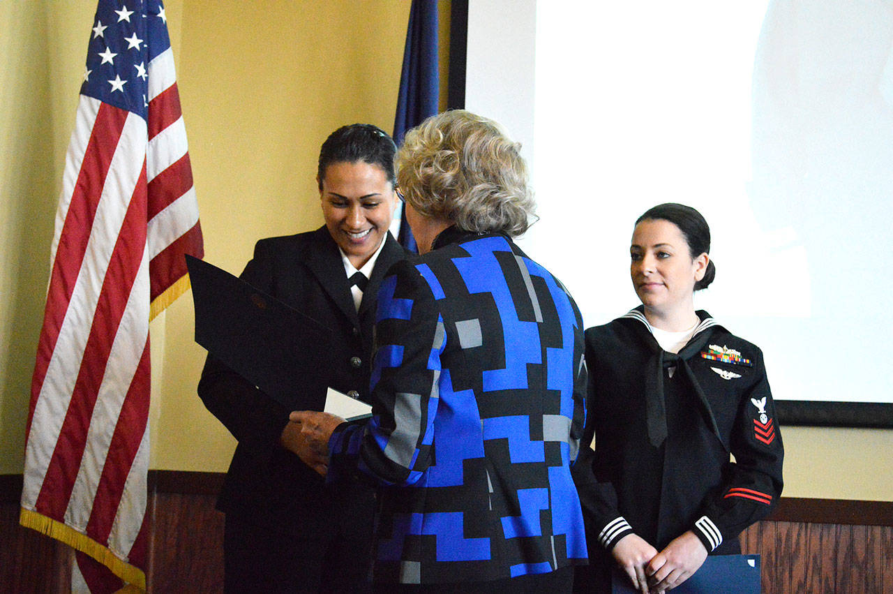 Sen. Barbara Bailey, R-Oak Harbor, recognizes the Oak Harbor Navy League and Rotary Club Sailors of the Year at a luncheon Friday. Left: Jennifer Deburkarte, logistics specialist first class, and Sheri Russell, religious programs specialist first class, were named the reserve and shore Sailors of the Year respectively. Sea Sailor of the Year Dustin Walker, aviation ordnanceman first class could not attend the luncheon because he was on detachment in Florida. Photo by Laura Guido/Whidbey News-Times
