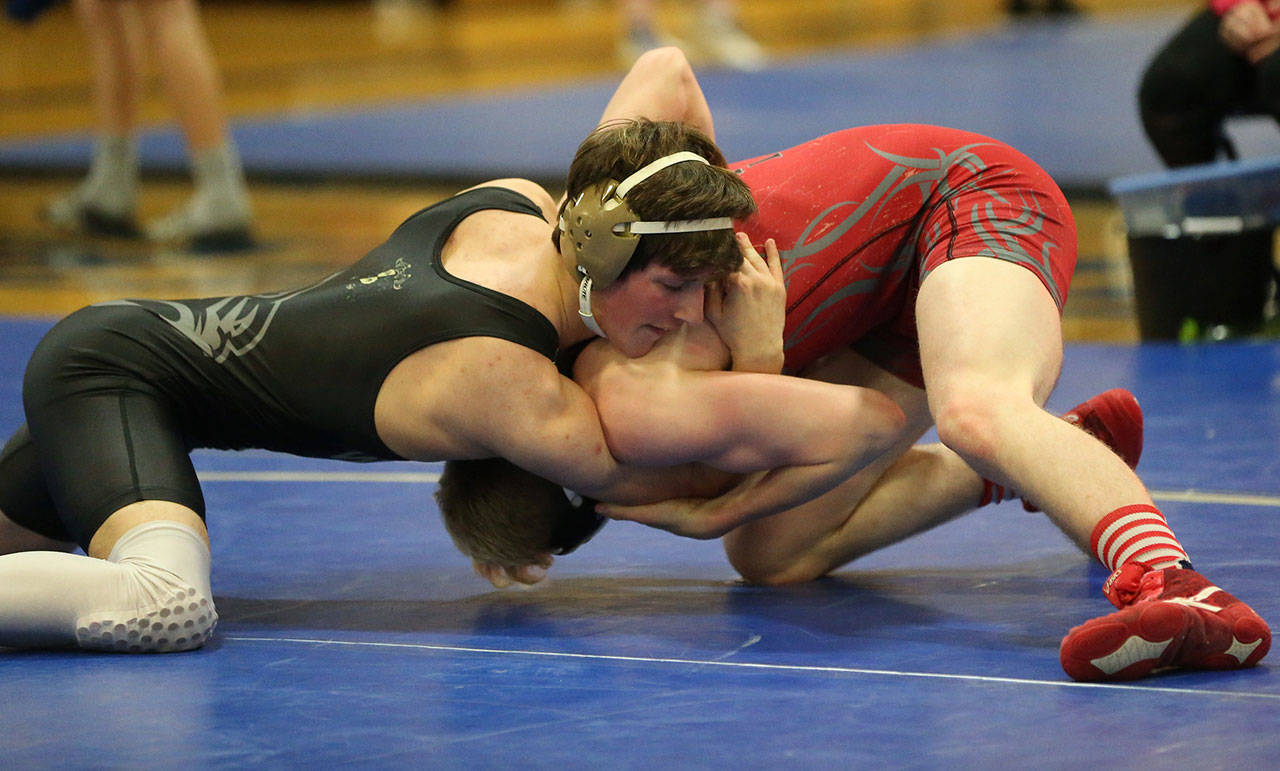 Blake McBride fights for a take down in the championship match Saturday.(Photo by John Fisken)
