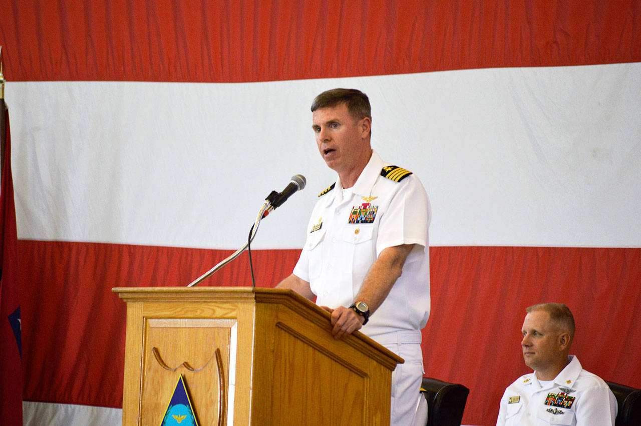 Capt. Geoffrey Moore, base commanding officer, speaks at the 75th Anniversary of the Naval Air Station Whidbey Island in September. Photo by Laura Guido/Whidbey News-Times