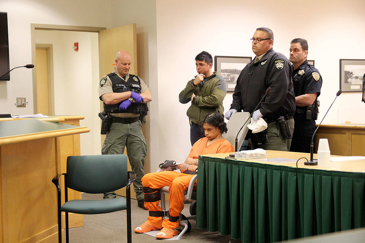 Photo by Jessie Stensland / Whidbey News-Times                                Louis Scarpino of Oak Harbor appears in Island County Superior Court in a restraint chair Wednesday, accused of being disorderly and intimidating a judge.