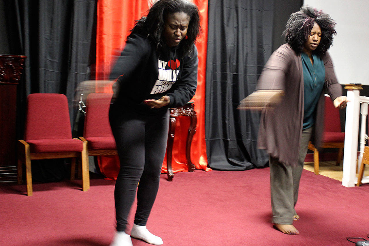 Praise Dancers of Mission Ministry Outreach practice for the annual Oak Harbor Martin Luther King Jr. Day tribute. Wismine Davilar (left) and Jendayi Stafford will be among many performers at Sunday’s afternoon service. Photo by Patricia Guthrie/Whidbey News-Times