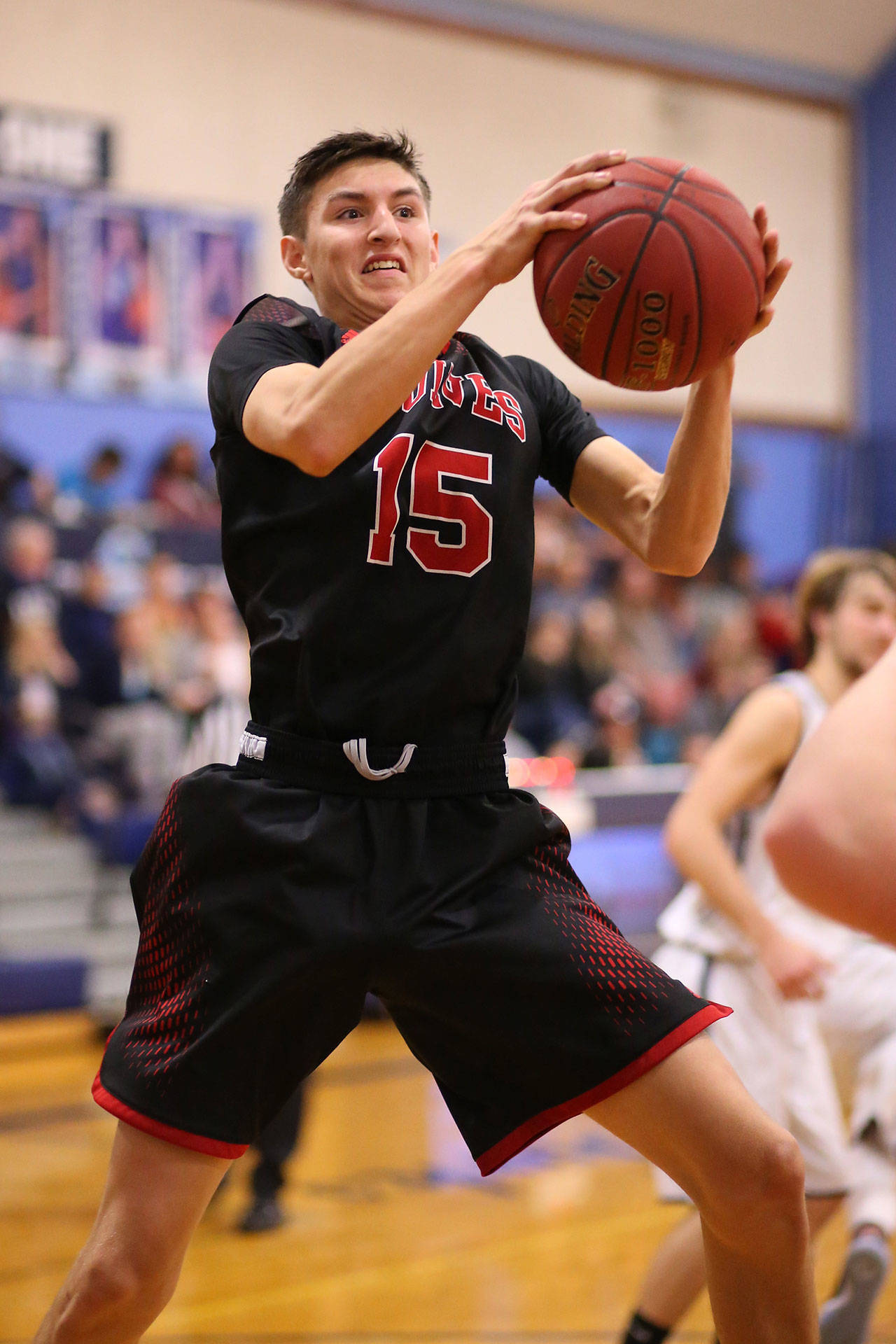 Joey Lippo rips down one of his 10 rebounds at Sultan Saturday.(Photo by John Fisken)