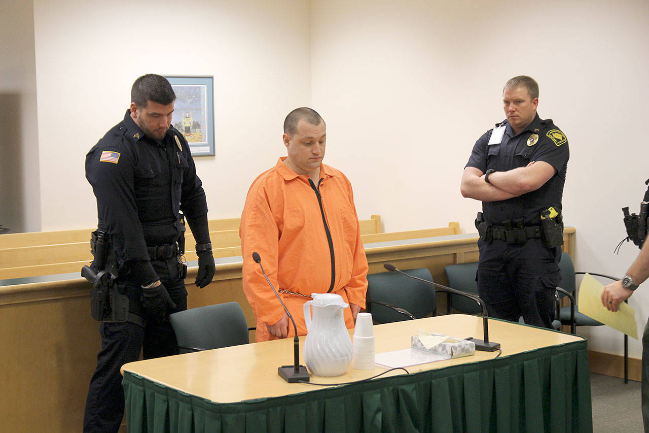 Convicted killer returns to court, pleads not guilty