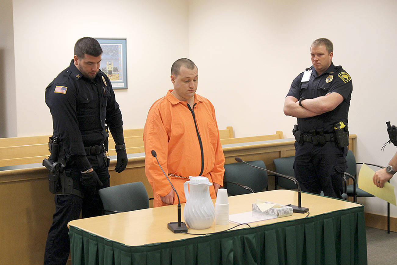 Convicted killer returns to court, pleads not guilty