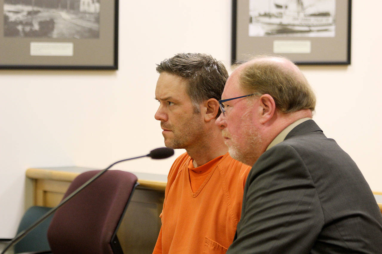 Photo by Jessie Stensland / Whidbey News-Times                                Blake Fountain appears in court last year with attorney Craig Platt. Fountain is accused of starting a fire that burned down two houses on South Whidbey.